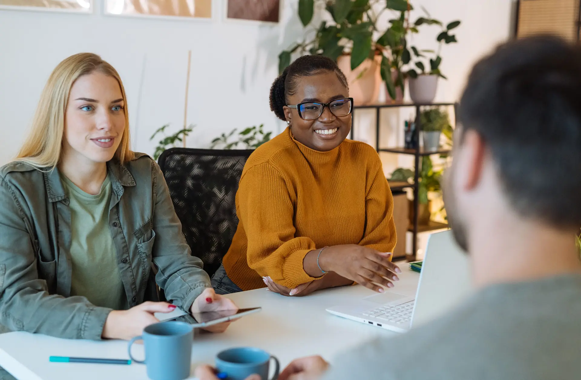 Team of young diverse entrepreneurs working together